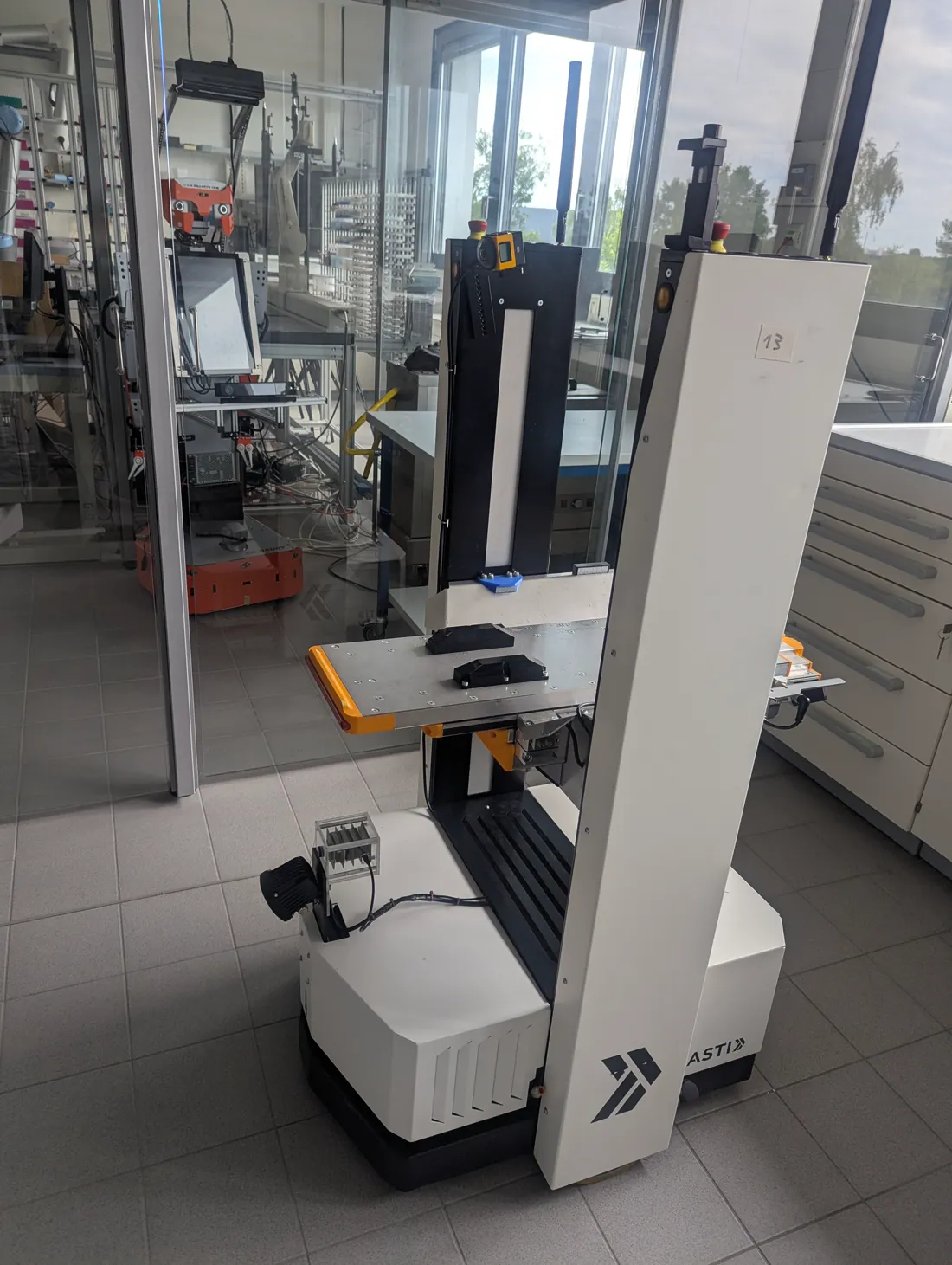 MOLAR, an ASTI ProBot L mobile laboratory robot with a lift and transfer deck, photographed in the CELISCA automation laboratory